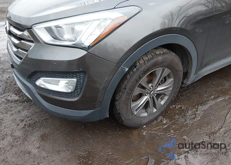 2014 Hyundai Santa Fe Sport 2.4L z USA, uszkodzony, nr VIN 5XYZUDLB1EG206574